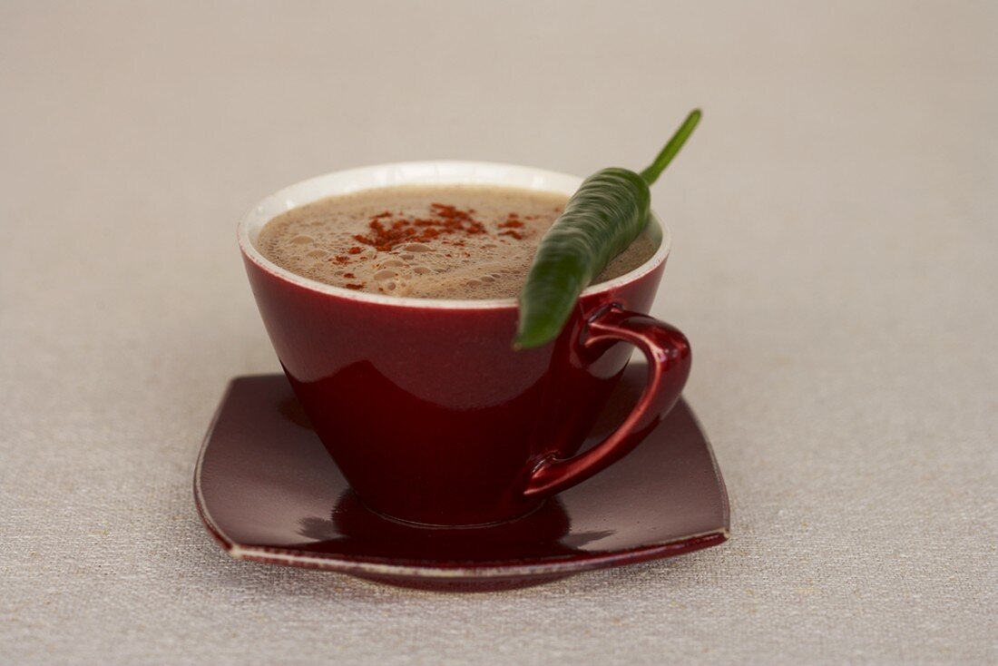 A cup of hot chilli chocolate with chilli