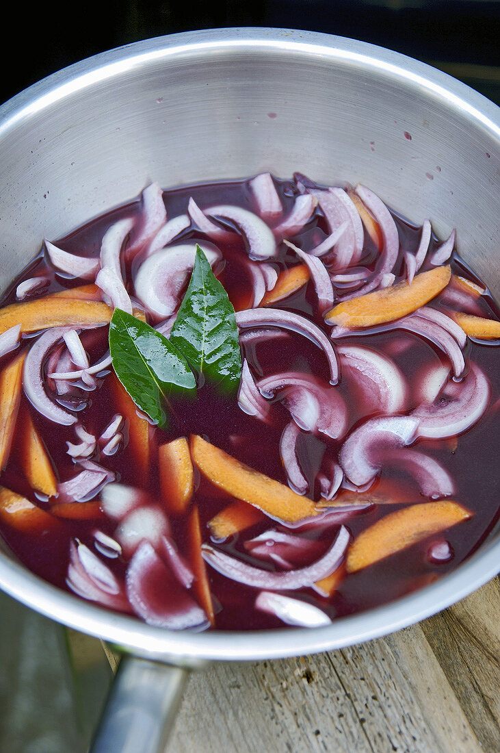 Red wine marinade with carrots, onions, bay leaves