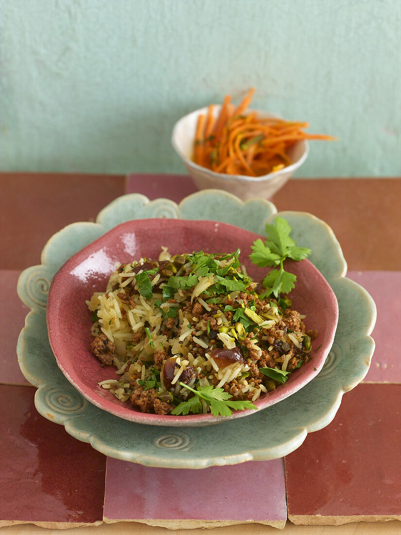 Minced lamb with rice, dates, pistachios and parsley