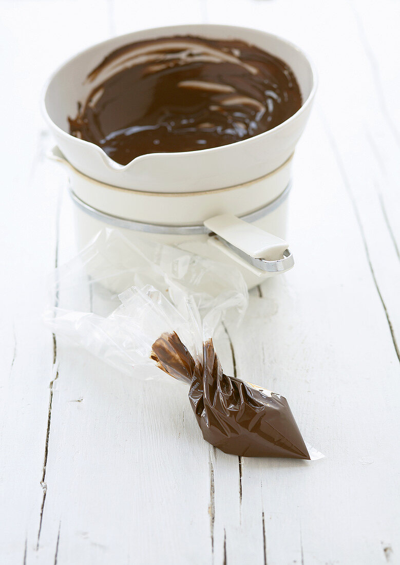 Melted chocolate in a piping bag