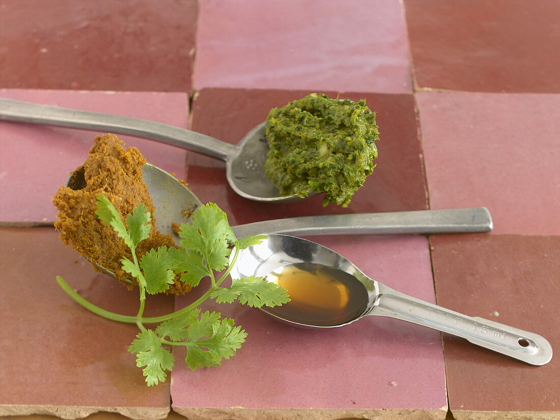Spice pastes, fish sauce and coriander leaves