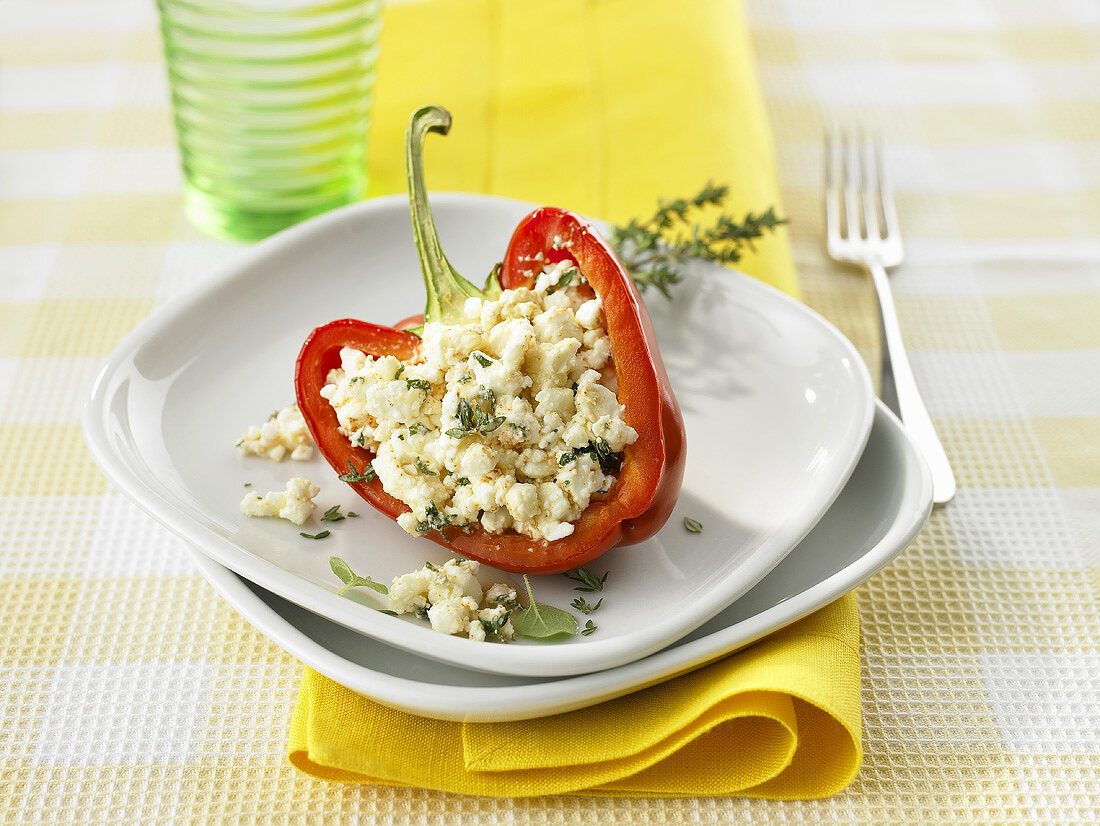 Half a red pepper stuffed with goat's cheese
