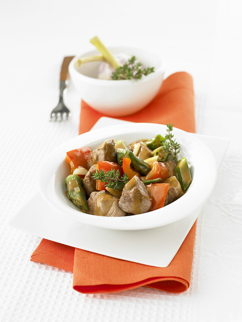 Lamb goulash with okra and peppers