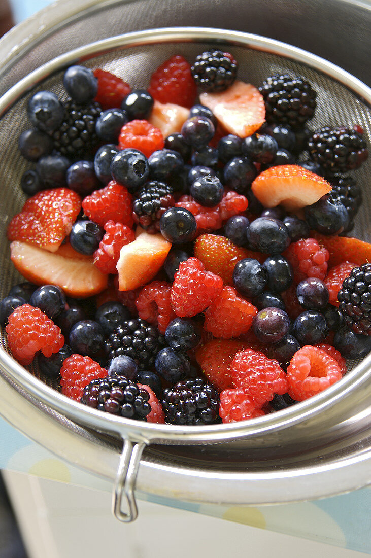 Fresh berries in a sieve