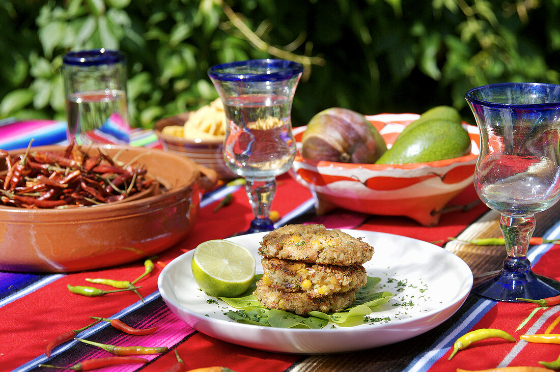 Three chicken and vegetable burgers out of doors (Mexico)