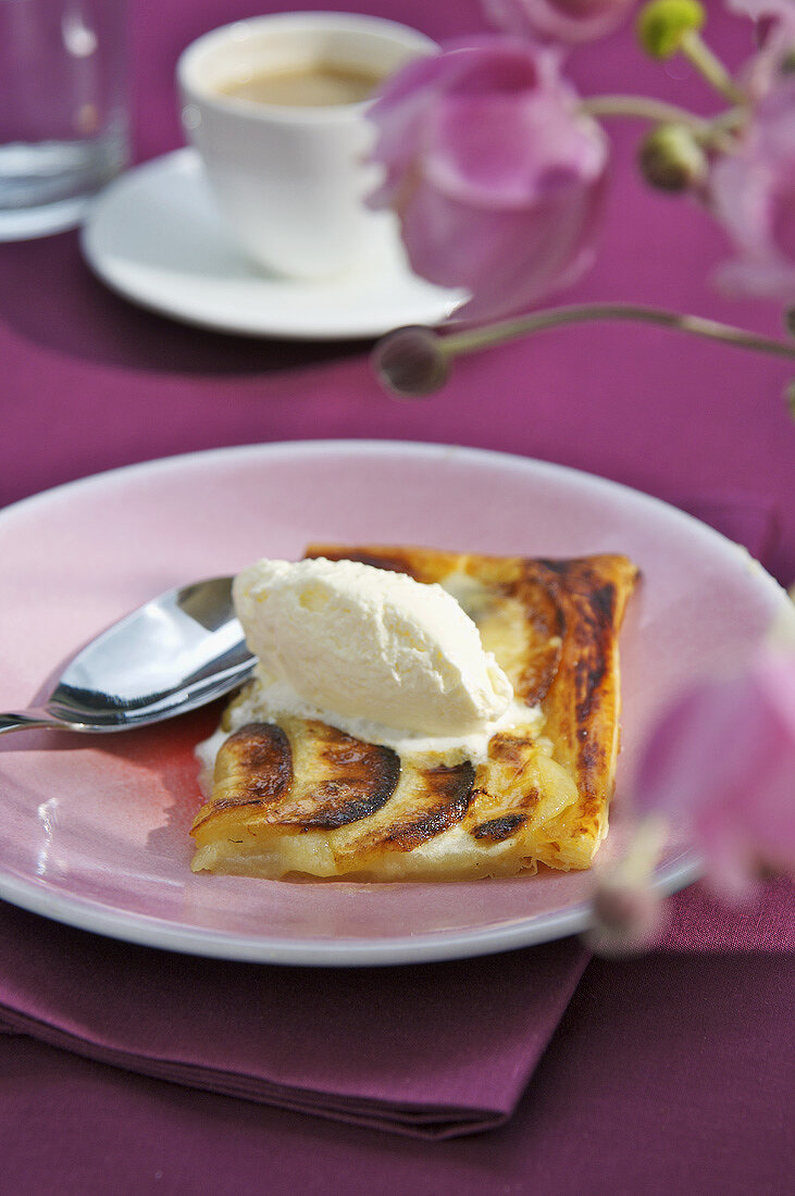 Piece of apple tart with vanilla ice cream