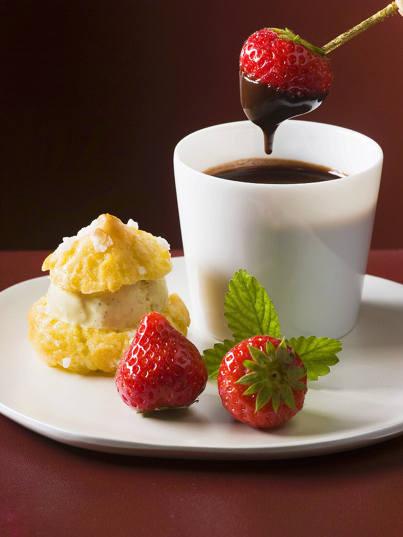 Strawberry dipped in chocolate fondue