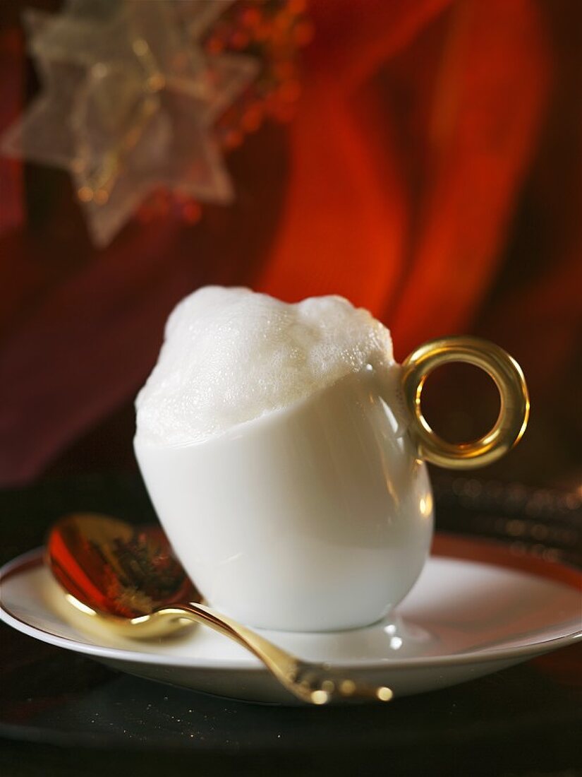 Coffee mousse with milk froth in a cup
