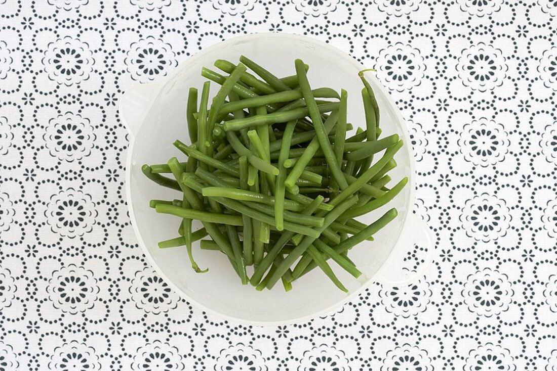 Cooked green beans in a dish