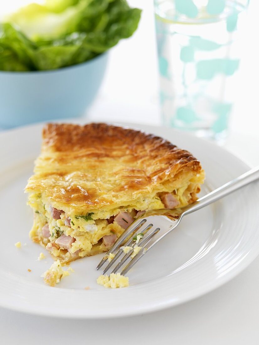 A piece of ham and leek pie
