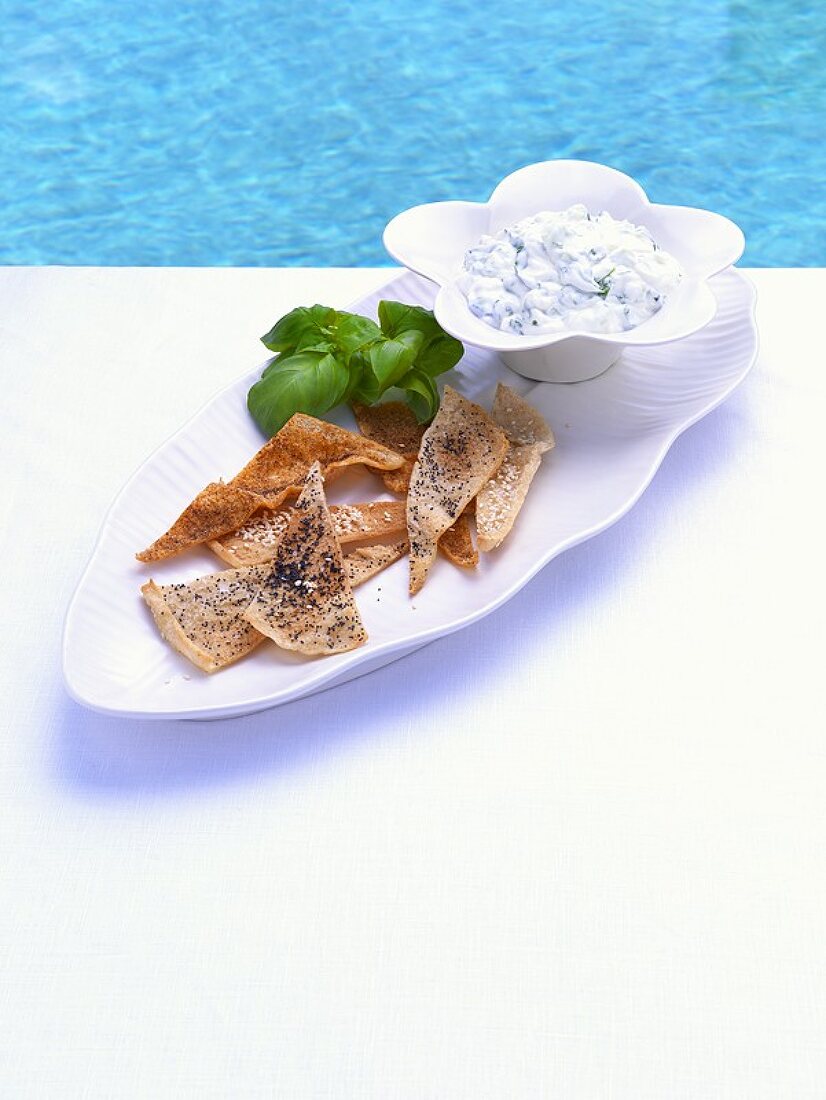 Basil tzatziki with thin, crisp bread