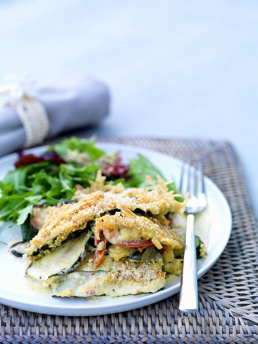 Courgette gratin with salad leaves