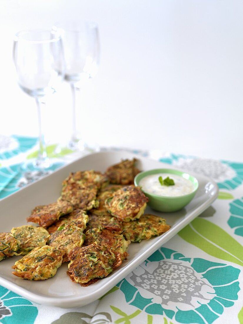 Courgette and feta cakes with yoghurt dip