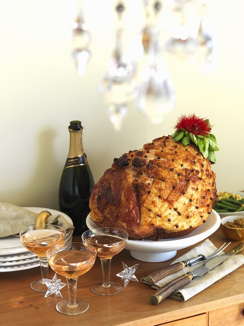 Roast ham studded with cloves, champagne