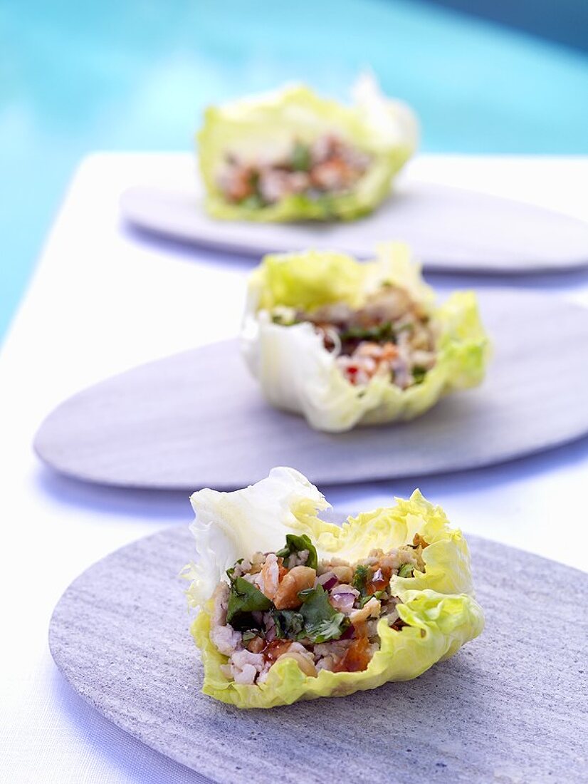 Larb gai in Chinese cabbage leaves (Chicken salad, Thailand)