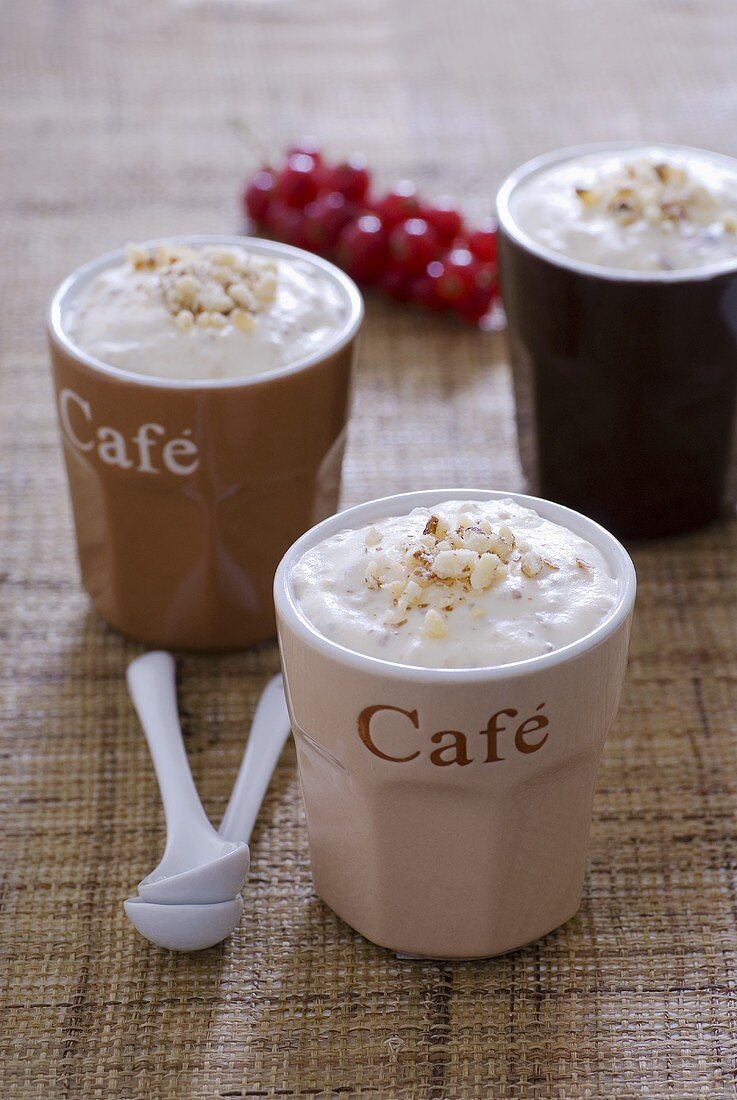 Almond mousse in three coffee beakers