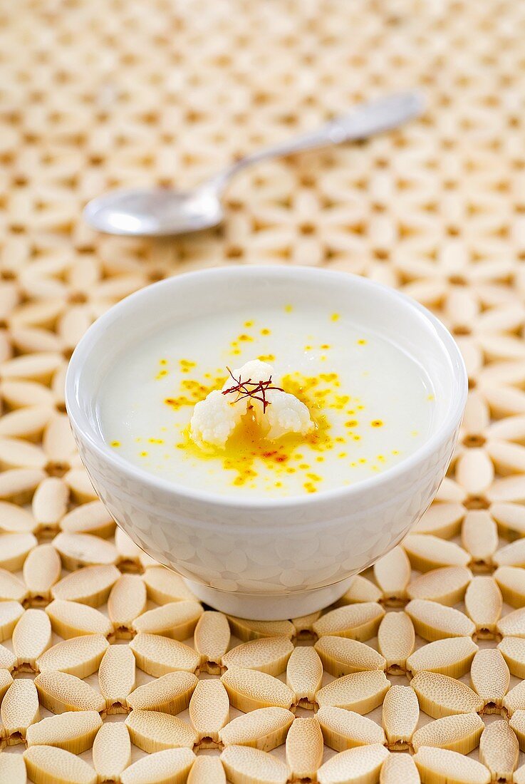 Cauliflower soup with saffron in a bowl