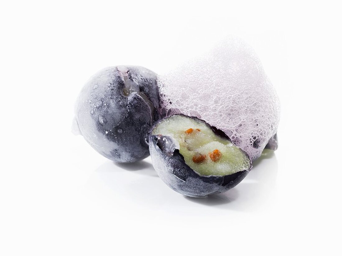 Molecular cuisine: frozen blueberry with foam
