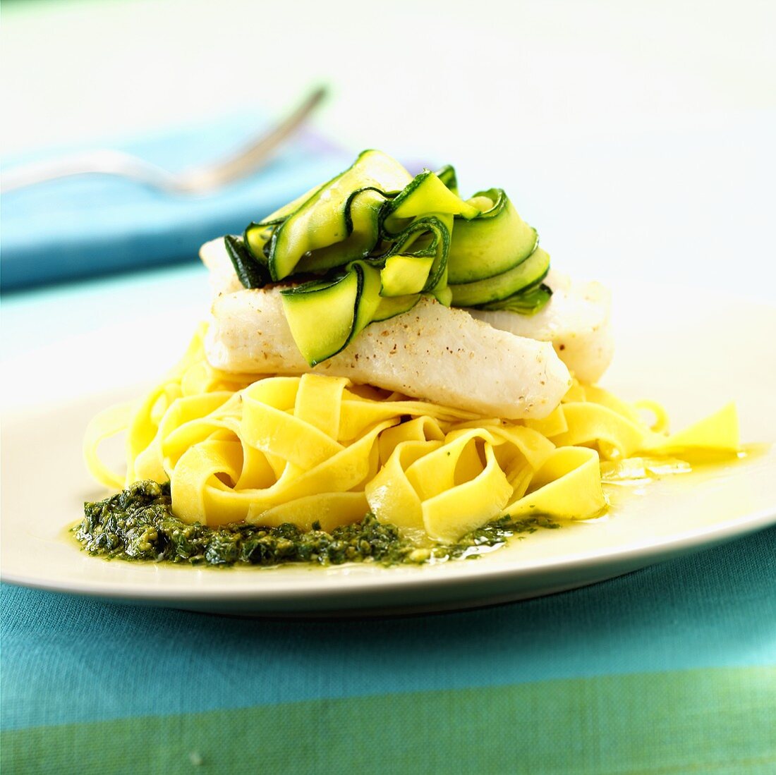Turbot and courgettes on ribbon pasta with pesto
