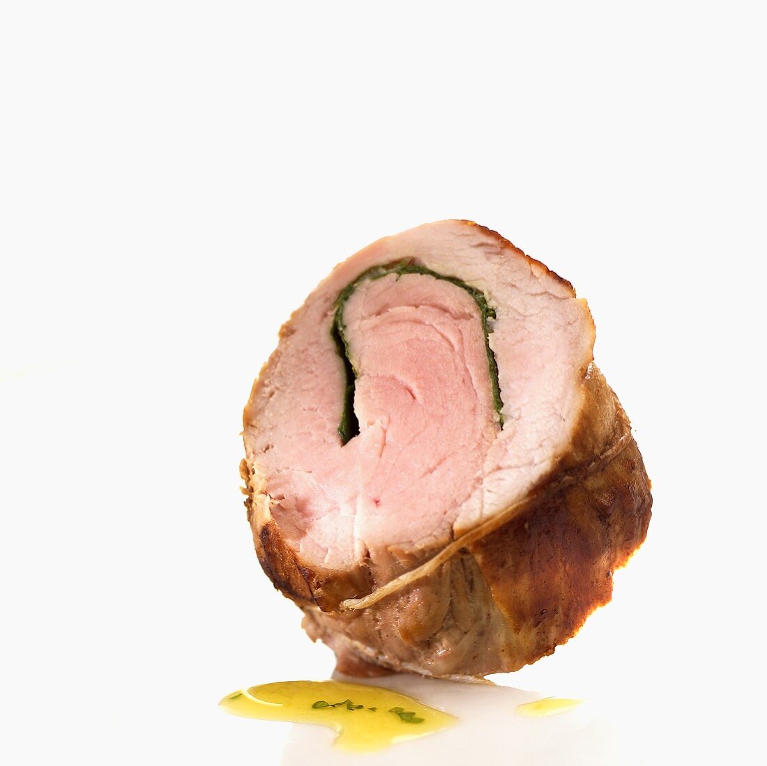 A slice of stuffed pork fillet