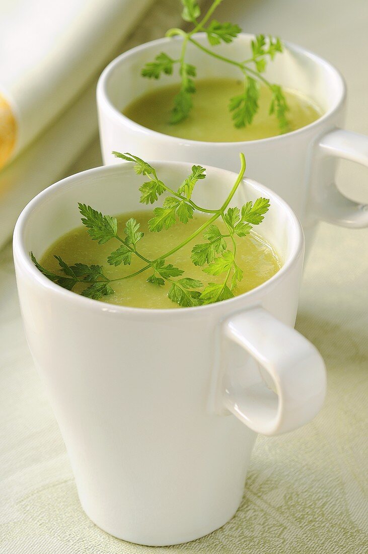 Potato and leek soup in cups with chervil