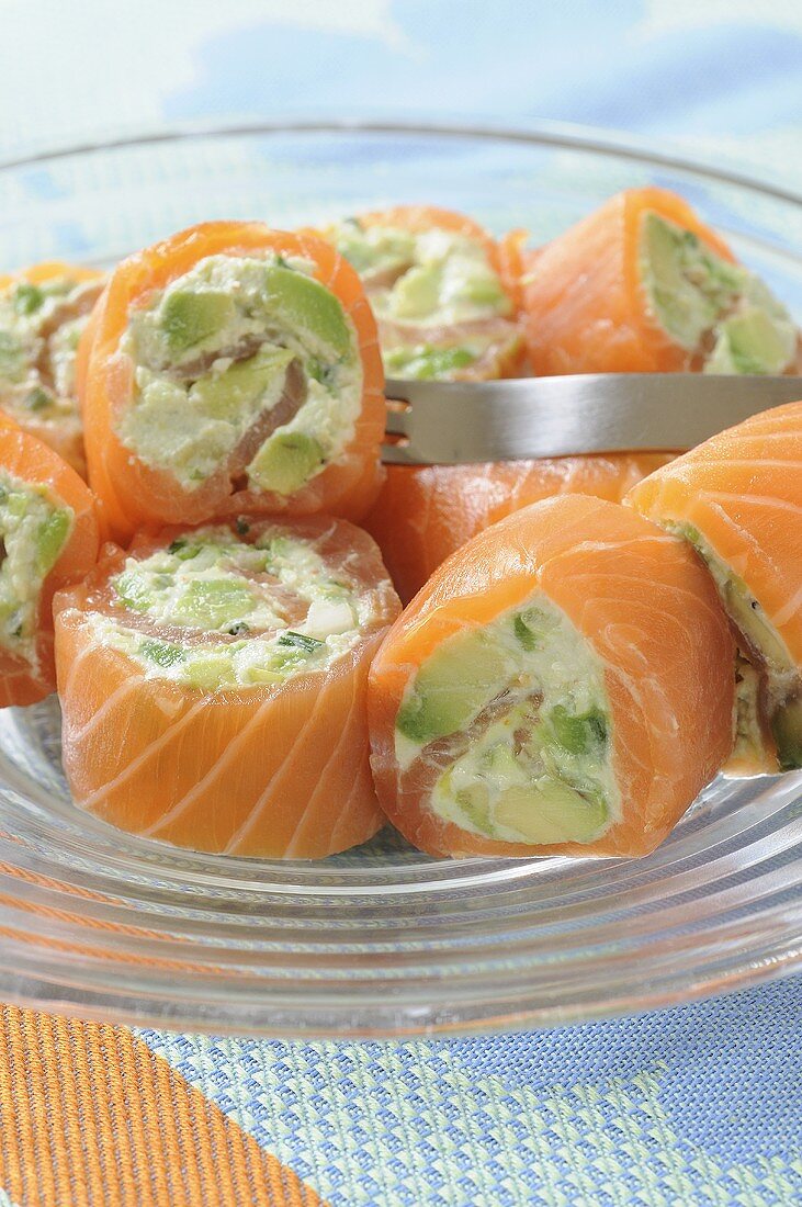 Smoked salmon rolls filled with avocado