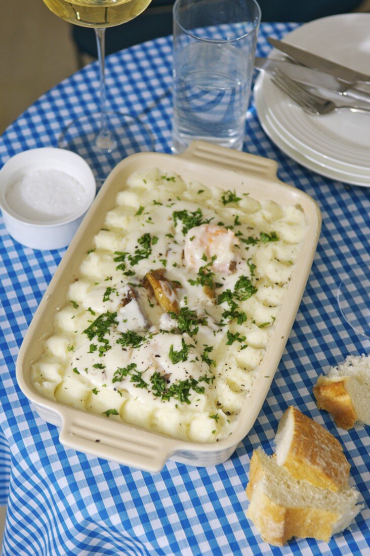 Fish pie (coley ragout with mashed potato) in a baking dish