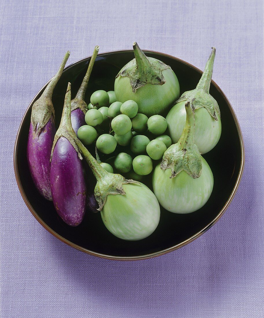 Various types of Thai aubergines on a plate