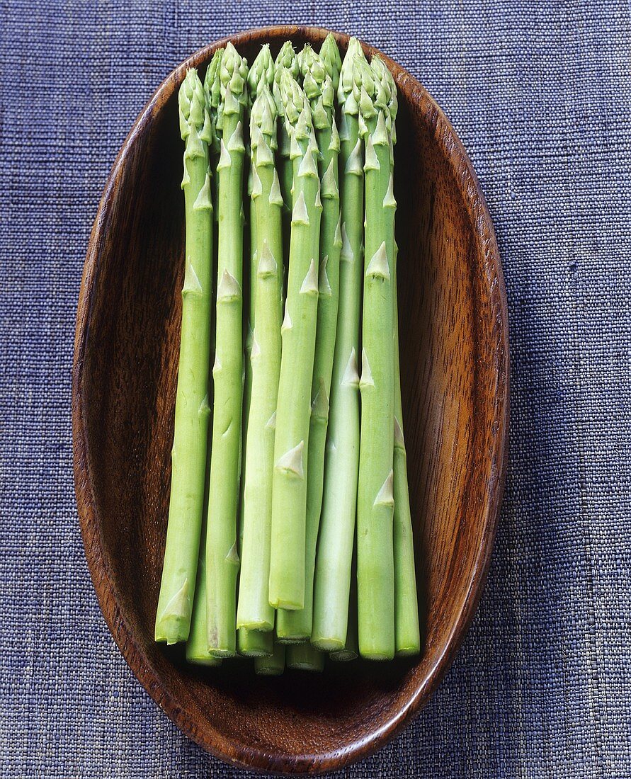 Thai asparagus in a wooden bowl