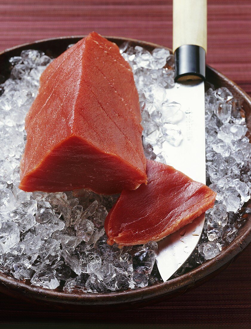 Fresh tuna, one slice cut, on ice