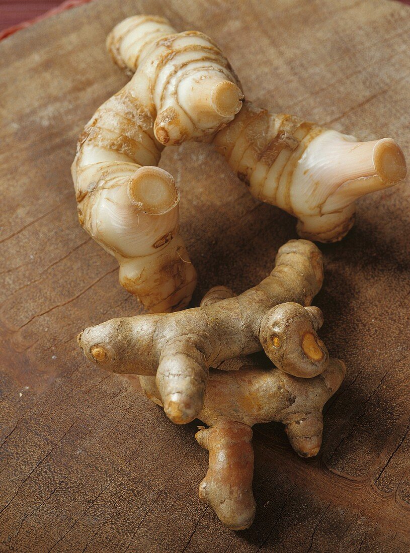 Galangal root and two turmeric roots