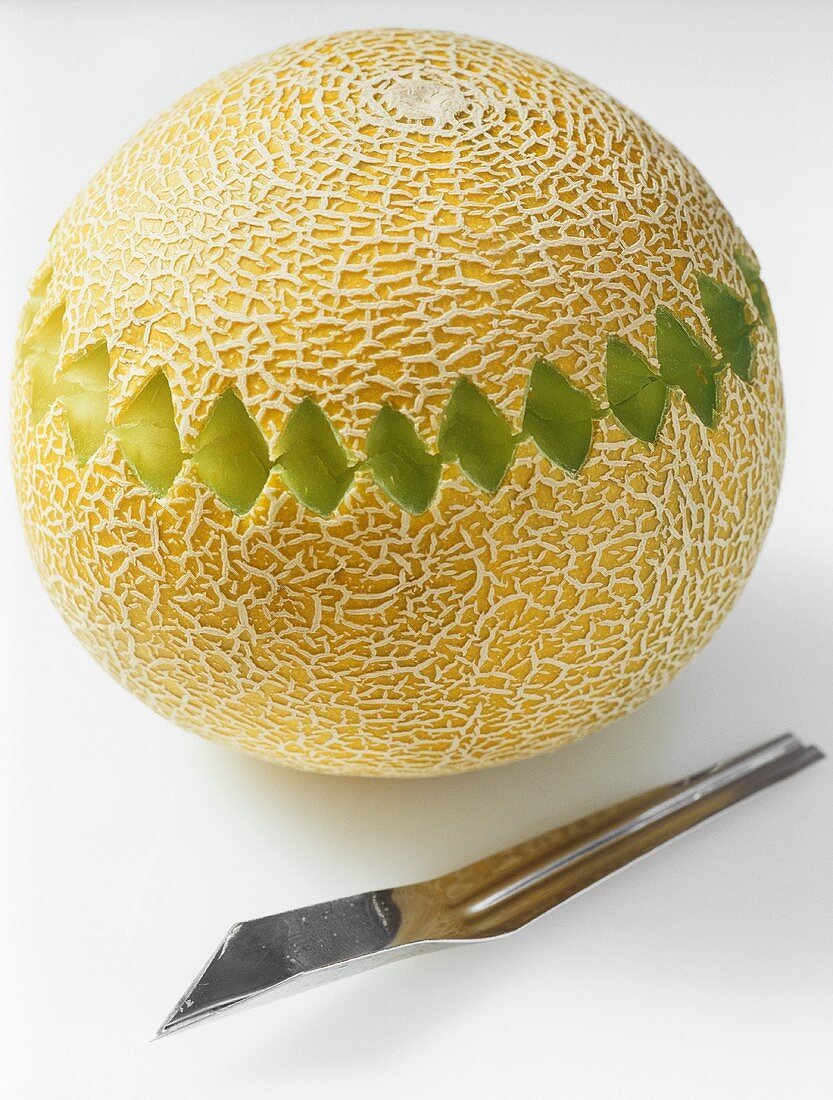 A carved netted melon