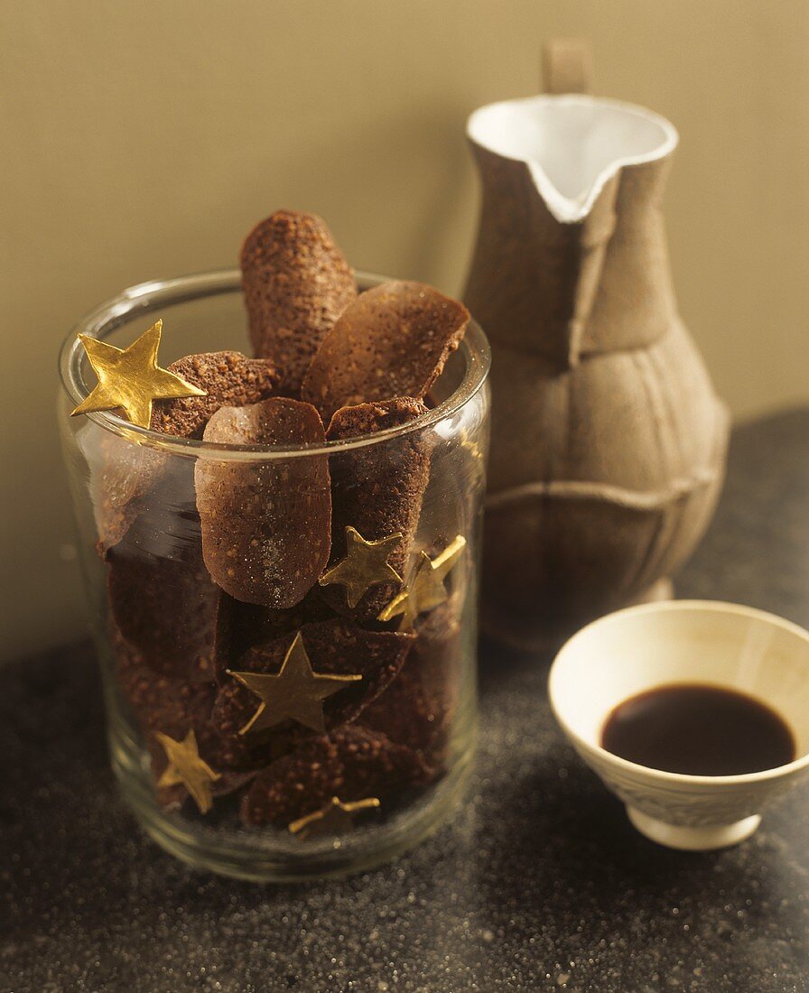 Chocolate orange biscuits and stars in a jar