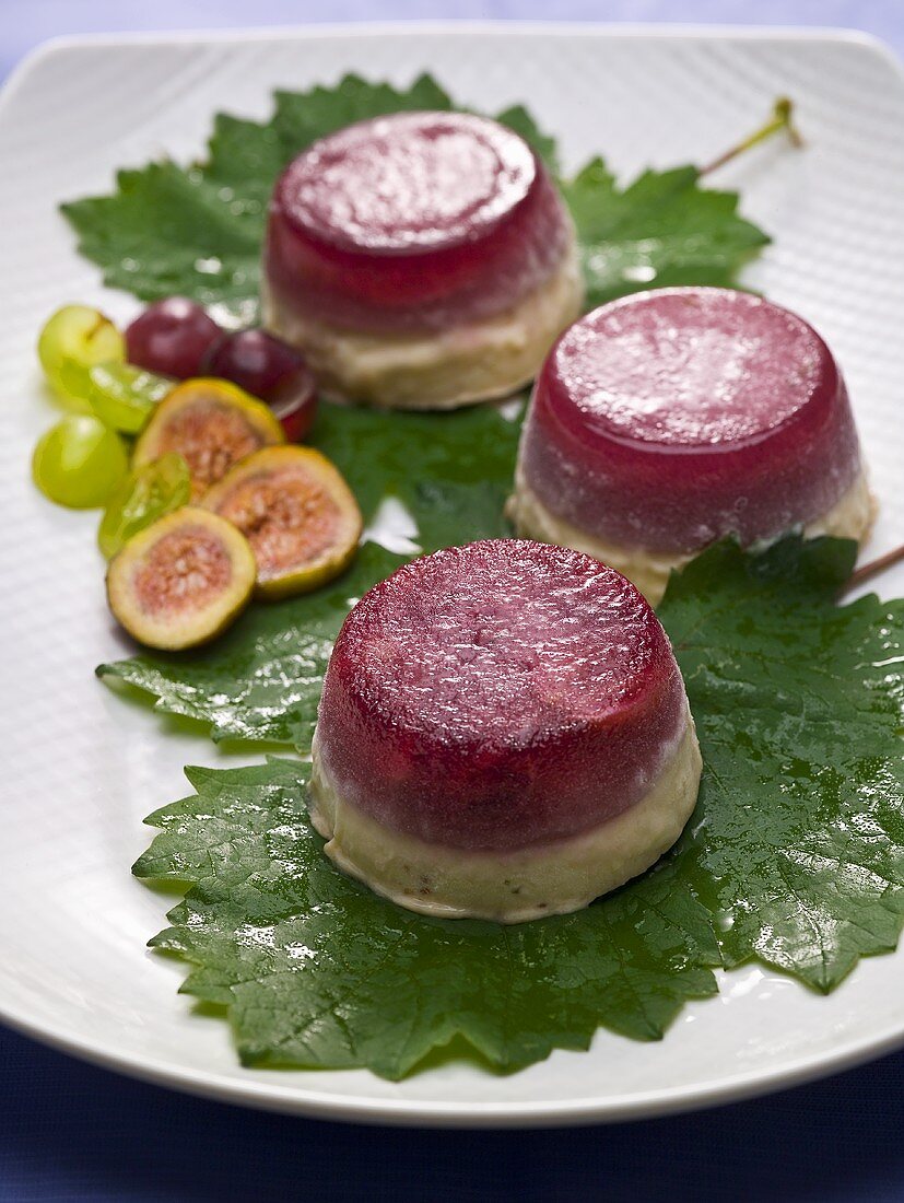 Grape and fig mousse on fig leaves