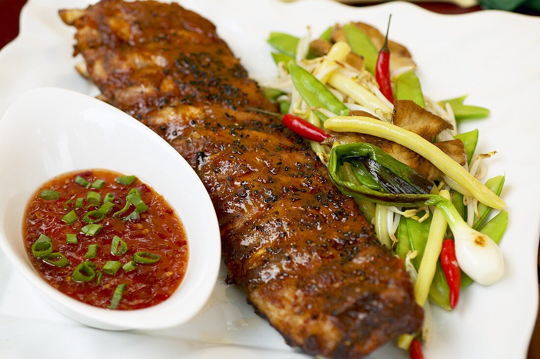 Sweet & sour marinated, grilled pork ribs with vegetables