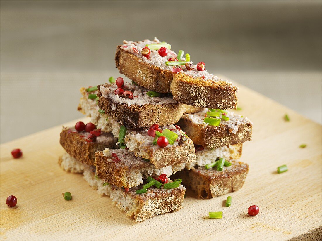 A stack of toasted wholemeal bread fingers with cod liver