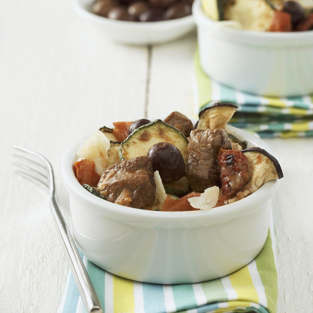 Pork with roasted vegetables in a bowl