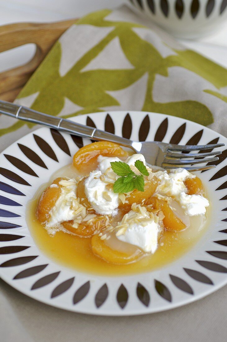 Poached apricots with yoghurt and almonds
