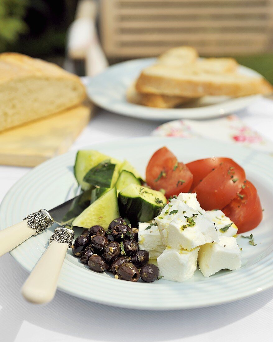 Mediterranean breakfast: tomatoes, cucumber, feta, olives