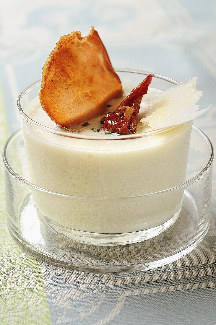 Cold fennel cream soup in glass, fried ham, Parmesan