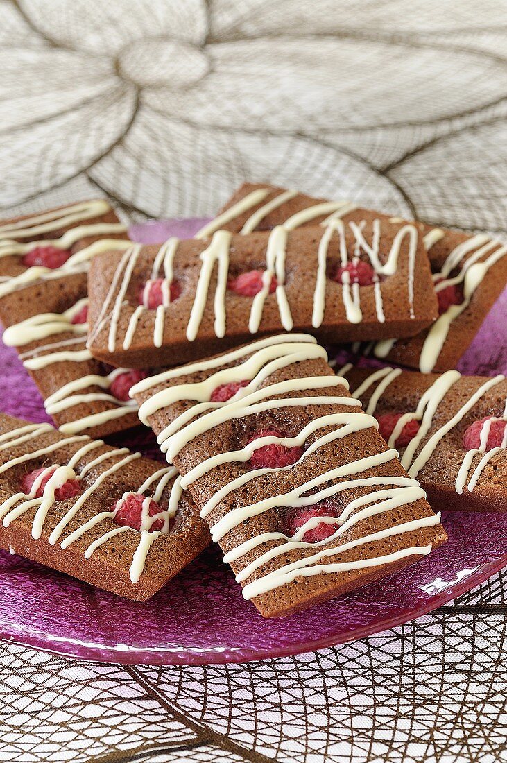 Financiers with white chocolate and raspberries