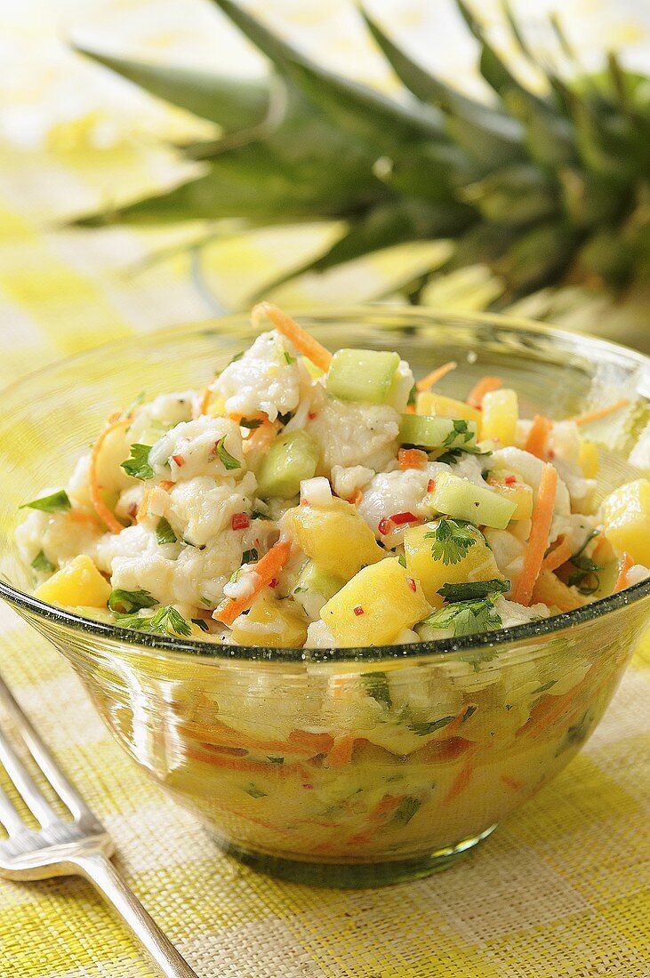 Fish, cucumber & pineapple salad with coconut milk & coriander