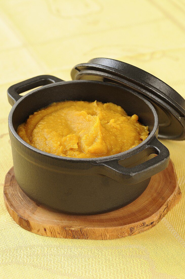 Mashed potato and lentils in a cast-iron pot