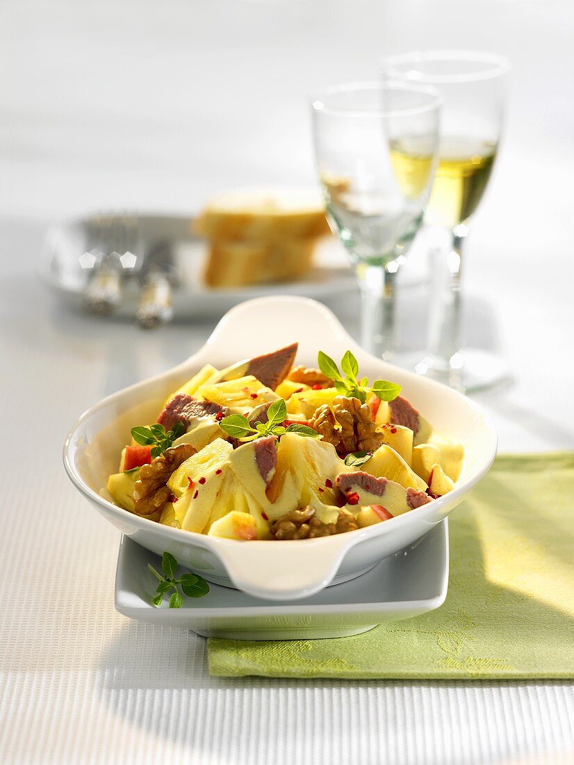 Pineapple and poultry meat salad with red pepper