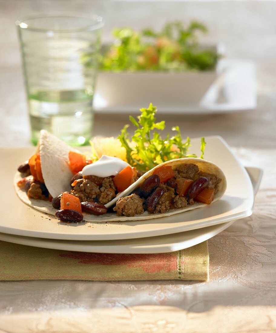 Chili con carne tortilla with sour cream