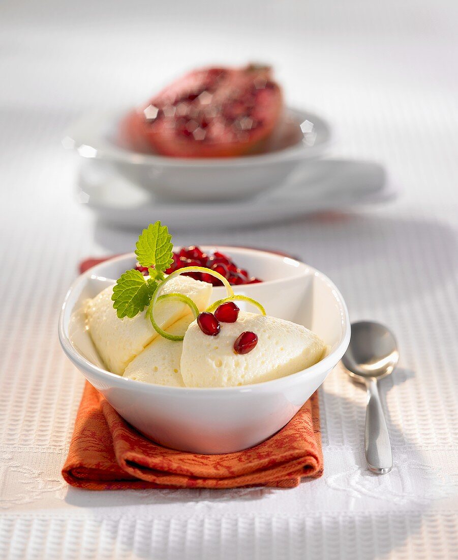 Champagne mousse with pomegranate seeds