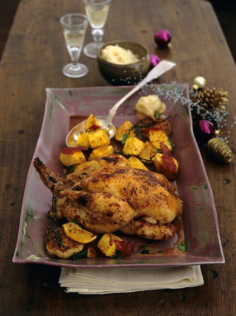 Ananas-Zitronen-Poularde mit Thymian, Knoblauch und Schinken