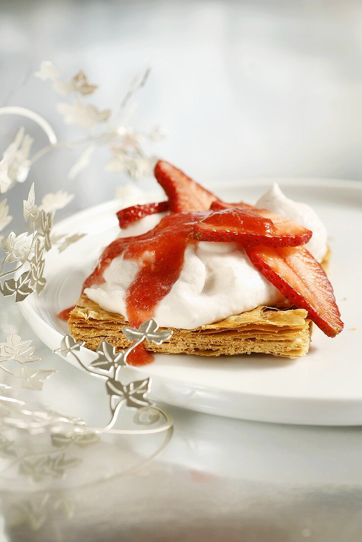Puff pastry with whipped cream and strawberries