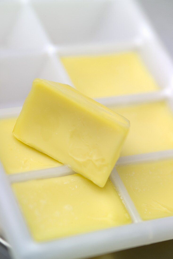 Olive oil ice cubes in ice cube tray