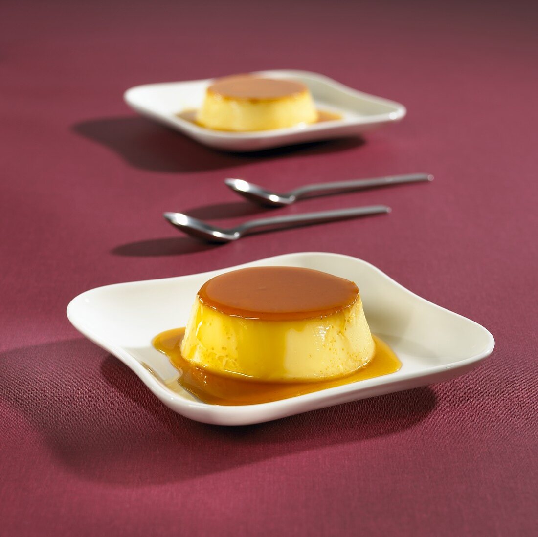 Crème caramel on two plates